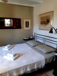 Säng eller sängar i ett rum på Villa Sofi in Saint George Antiparos (pool&sea)