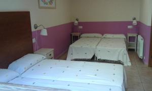 Postel nebo postele na pokoji v ubytování B&B Ra Tenaja