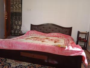 Letto o letti in una camera di Mir manzil