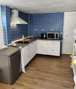Kuchyň nebo kuchyňský kout v ubytování Appartement indépendant dans La Croix du Sud
