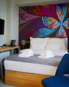 Postel nebo postele na pokoji v ubytování Hotel Skadarlija NB