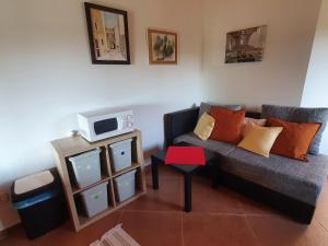 TV a/nebo společenská místnost v ubytování Casa dei Boscarini