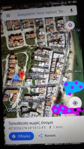 a screenshot of a google map of a resort at Peramos Apartments in Néa Péramos