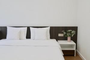 Postel nebo postele na pokoji v ubytování Hoang Loc Villa