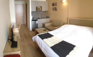 Postel nebo postele na pokoji v ubytování Nest 1 Hotel
