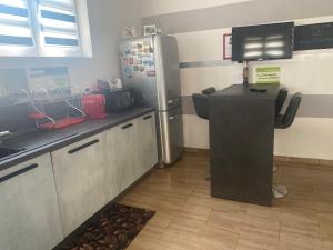 Kuchyň nebo kuchyňský kout v ubytování Guest House Persico