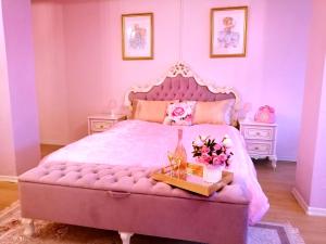 Ein Bett oder Betten in einem Zimmer der Unterkunft Lighane's Studio with Sailor Moon Room