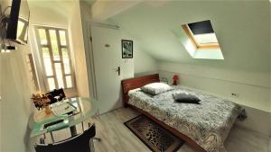 Postel nebo postele na pokoji v ubytování Guesthouse Sobe Silva