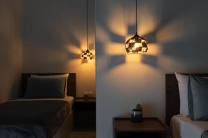 Postel nebo postele na pokoji v ubytování Hotel Astro