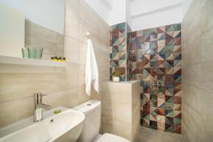 Koupelna v ubytování Hotel Astro