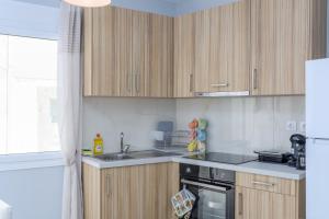 Kuchyňa alebo kuchynka v ubytovaní J&T Apartment - 150m from the beach