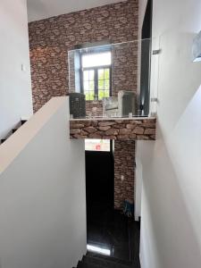 Kuchyň nebo kuchyňský kout v ubytování L'heure de la détente Spa privatif