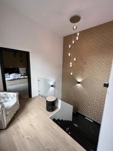 Postel nebo postele na pokoji v ubytování L'heure de la détente Spa privatif
