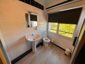 Koupelna v ubytování Hôtel des îles