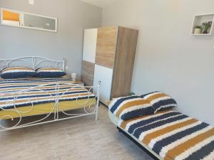 Voodi või voodid majutusasutuse Studio Apartment Palmira toas