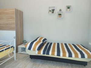 Voodi või voodid majutusasutuse Studio Apartment Palmira toas