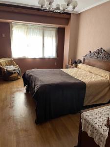 Кровать или кровати в номере Casa Jose