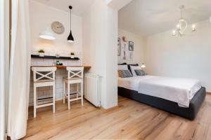 Posteľ alebo postele v izbe v ubytovaní Apartments Villa Istria Rovinj + 7 fotografií