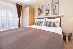 Posteľ alebo postele v izbe v ubytovaní Apartments Villa Istria Rovinj