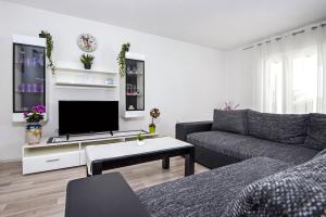 Telewizja i/lub zestaw kina domowego w obiekcie Casa Marin