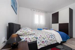 Łóżko lub łóżka w pokoju w obiekcie Casa Marin