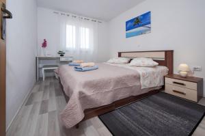 Łóżko lub łóżka w pokoju w obiekcie Casa Marin