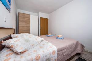 Łóżko lub łóżka w pokoju w obiekcie Casa Marin