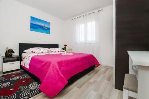 Łóżko lub łóżka w pokoju w obiekcie Casa Marin
