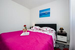 Łóżko lub łóżka w pokoju w obiekcie Casa Marin
