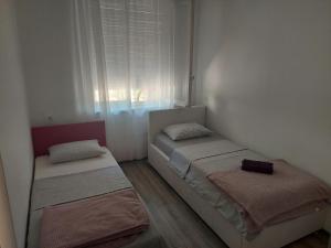 Llit o llits en una habitació de Apartment Cvita