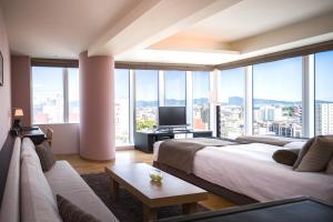 TV a/nebo společenská místnost v ubytování Hotel Arc Riche Toyohashi