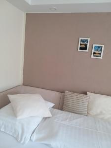 Postel nebo postele na pokoji v ubytování CHILL&SLEEP Bad Ischl