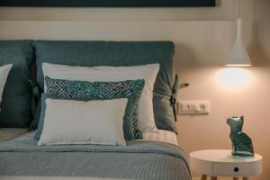 Postel nebo postele na pokoji v ubytování Olea O' Luxury Living