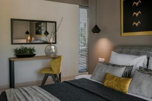 Postel nebo postele na pokoji v ubytování Olea O' Luxury Living