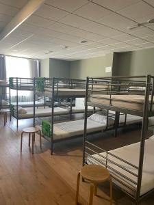 Bunk bed o mga bunk bed sa kuwarto sa Albergue Rem