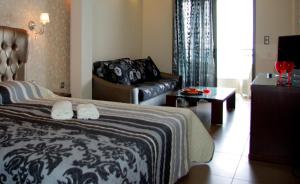 Postel nebo postele na pokoji v ubytování Dion Hotel + 37 fotografií