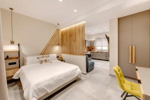 Postel nebo postele na pokoji v ubytování Argento urban apartment (sphere)