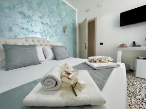 Posteľ alebo postele v izbe v ubytovaní B&B Poesia