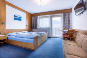 Postel nebo postele na pokoji v ubytování Gästehaus Wilhelmshof + 37 fotografií