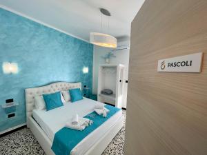 Posteľ alebo postele v izbe v ubytovaní B&B Poesia