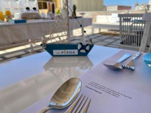 Reštaurácia alebo iné gastronomické zariadenie v ubytovaní B&B Poesia