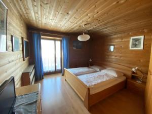 Posteľ alebo postele v izbe v ubytovaní Saskia Residence