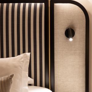 Cama ou camas em um quarto em Le Celtique & Spa