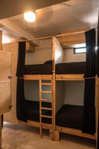 Palanda nebo palandy na pokoji v ubytování Maui Hostels Playa del Carmen