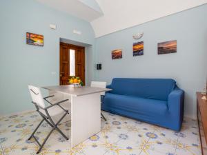 Posedenie v ubytovaní Casa Mariarosa - Seaside Apartment with Balcony