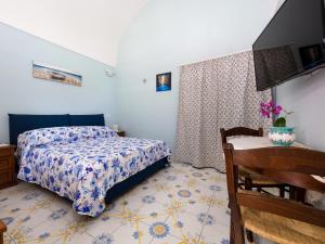Posteľ alebo postele v izbe v ubytovaní Casa Mariarosa - Seaside Apartment with Balcony
