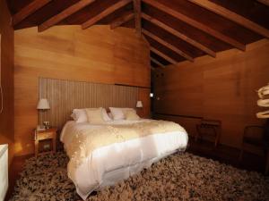 Postel nebo postele na pokoji v ubytování OCIO Territorial Hotel