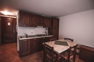 Kuchyň nebo kuchyňský kout v ubytování Residence Aquila - Mono Punta Regina