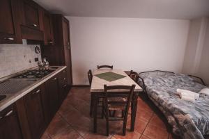 Postel nebo postele na pokoji v ubytování Residence Aquila - Mono Punta Regina