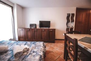 TV a/nebo společenská místnost v ubytování Residence Aquila - Mono Punta Regina